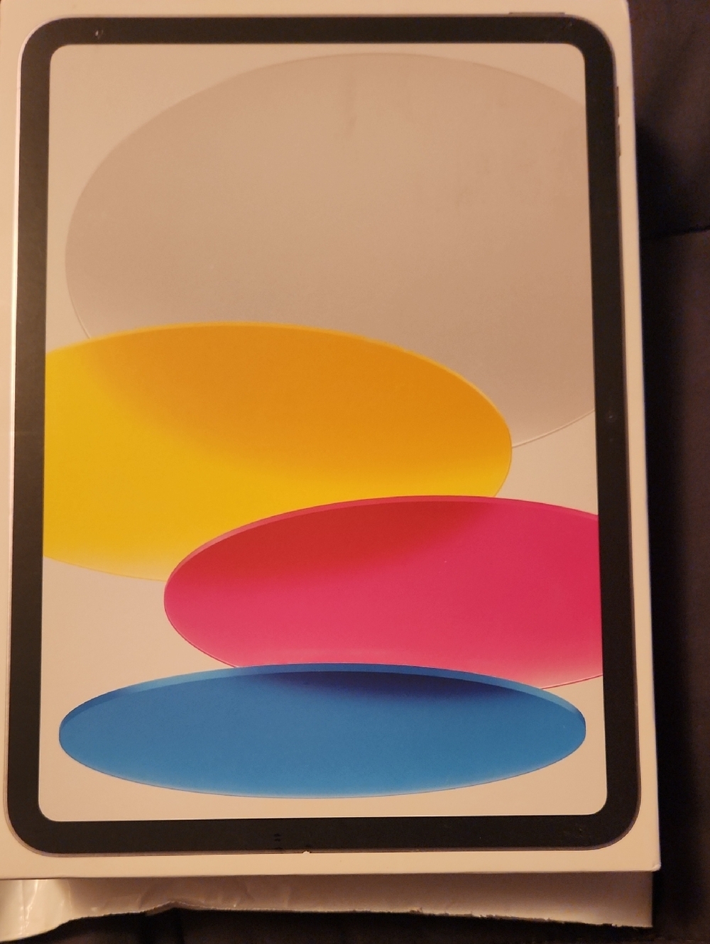 Apple Tablet with Pink, Yellow, Blue, and Gray Display